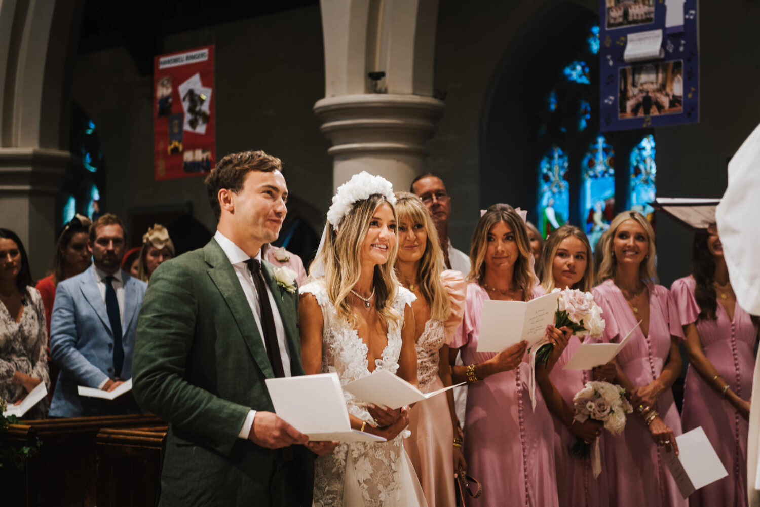 A bride and groom singing hymns