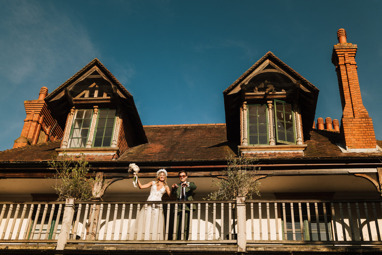 A couple on the balcony at D'oyly Carte Island in London