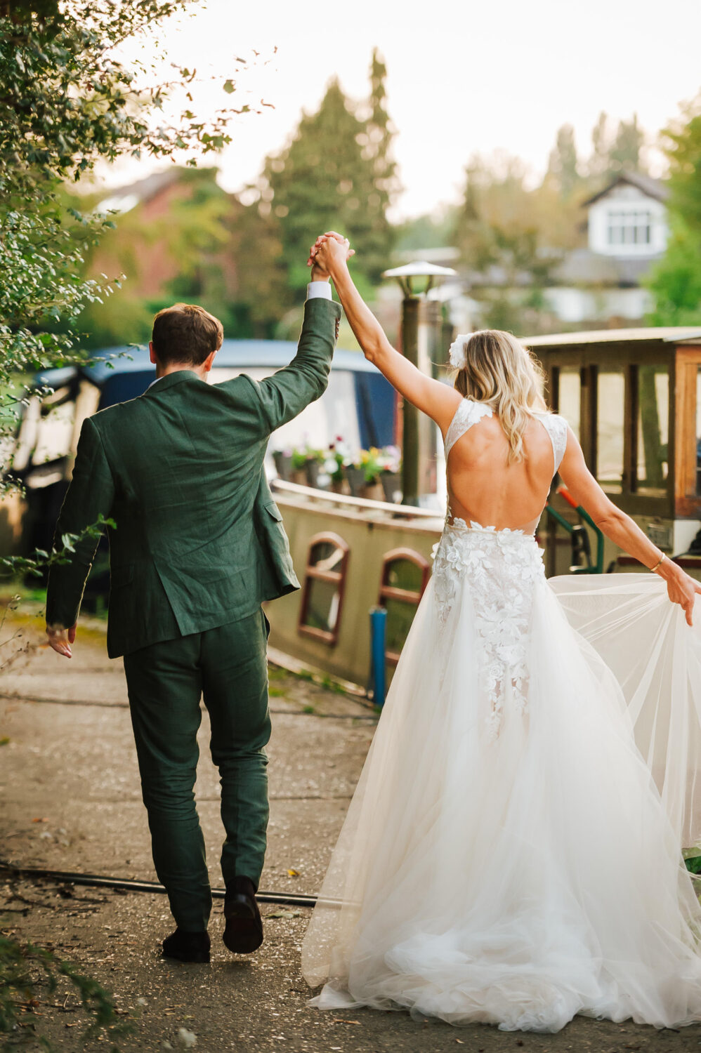 A bride and groom dancing on the river Thames