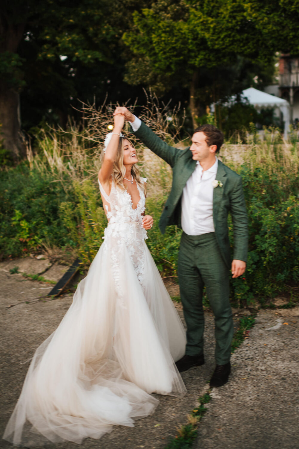 A bride and groom dancing on the river Thames
