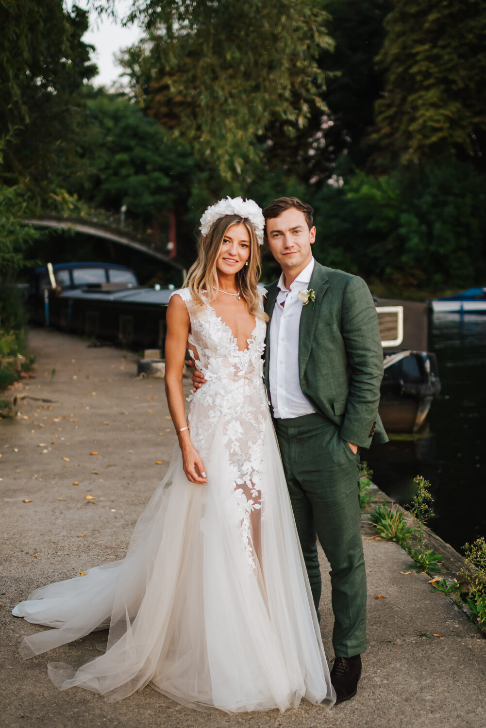 A beautiful newly married couple posing for a photo