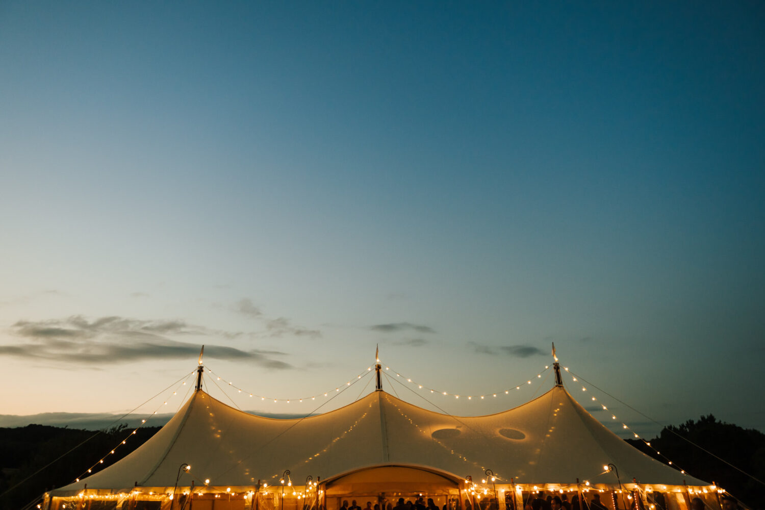 A Wills Marquee at sunset at a Yorkshire Wedding Photographed by James at Sugarbird